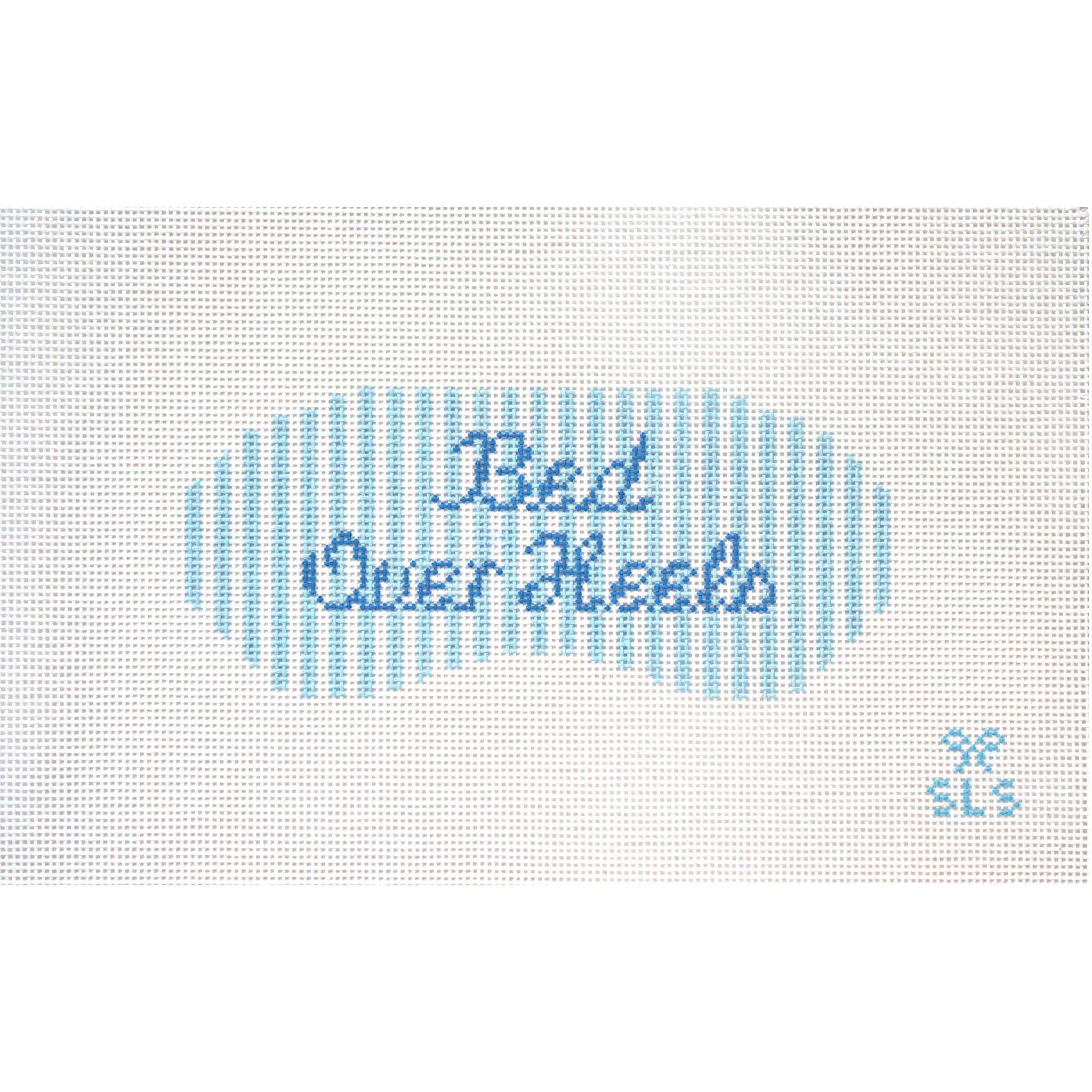 Needlepoint Canvas with 'Bed over heels' on a striped eye mask