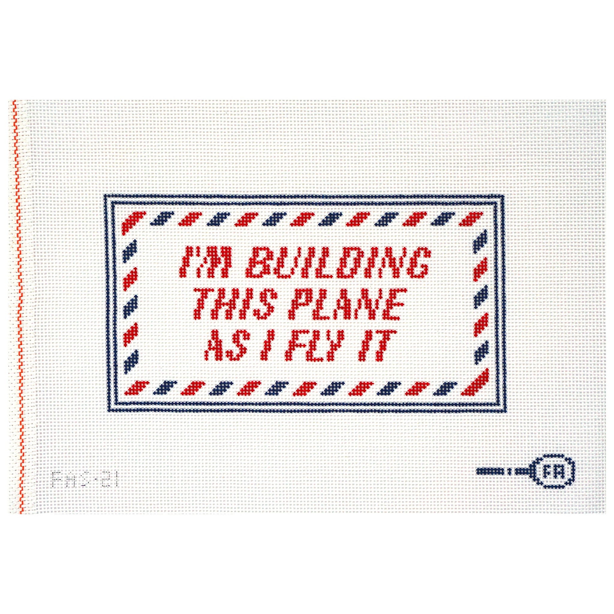 Needlepoint canvas with text 'I'm building this plane as I fly it' on a white background