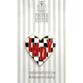 A needle minder design of a black and white checkered heart with the word "INDY" in the center to represent Indianapolis.