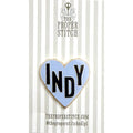 A needle minder design of a blue heart with the word "INDY" in the center to represent Indianapolis.