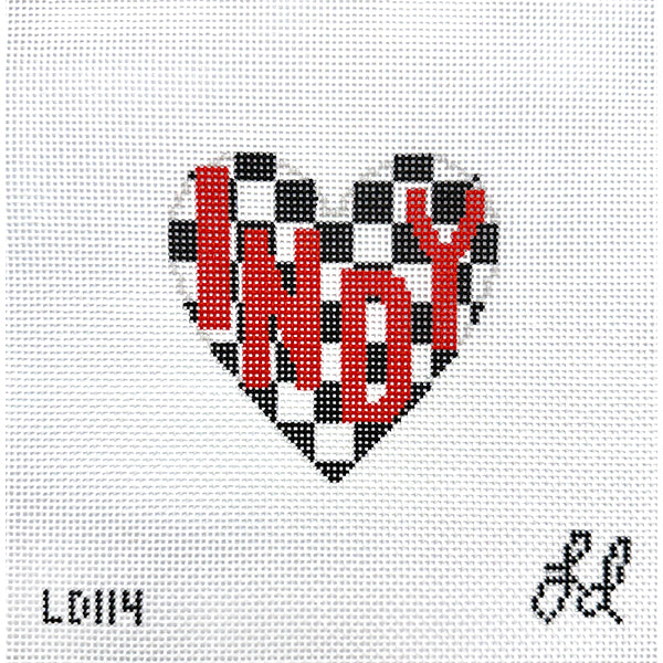 Needlepoint design in the shape of a heart with a checkered background and the word "INDY" in the center. Checkered flag for the Indy 500.