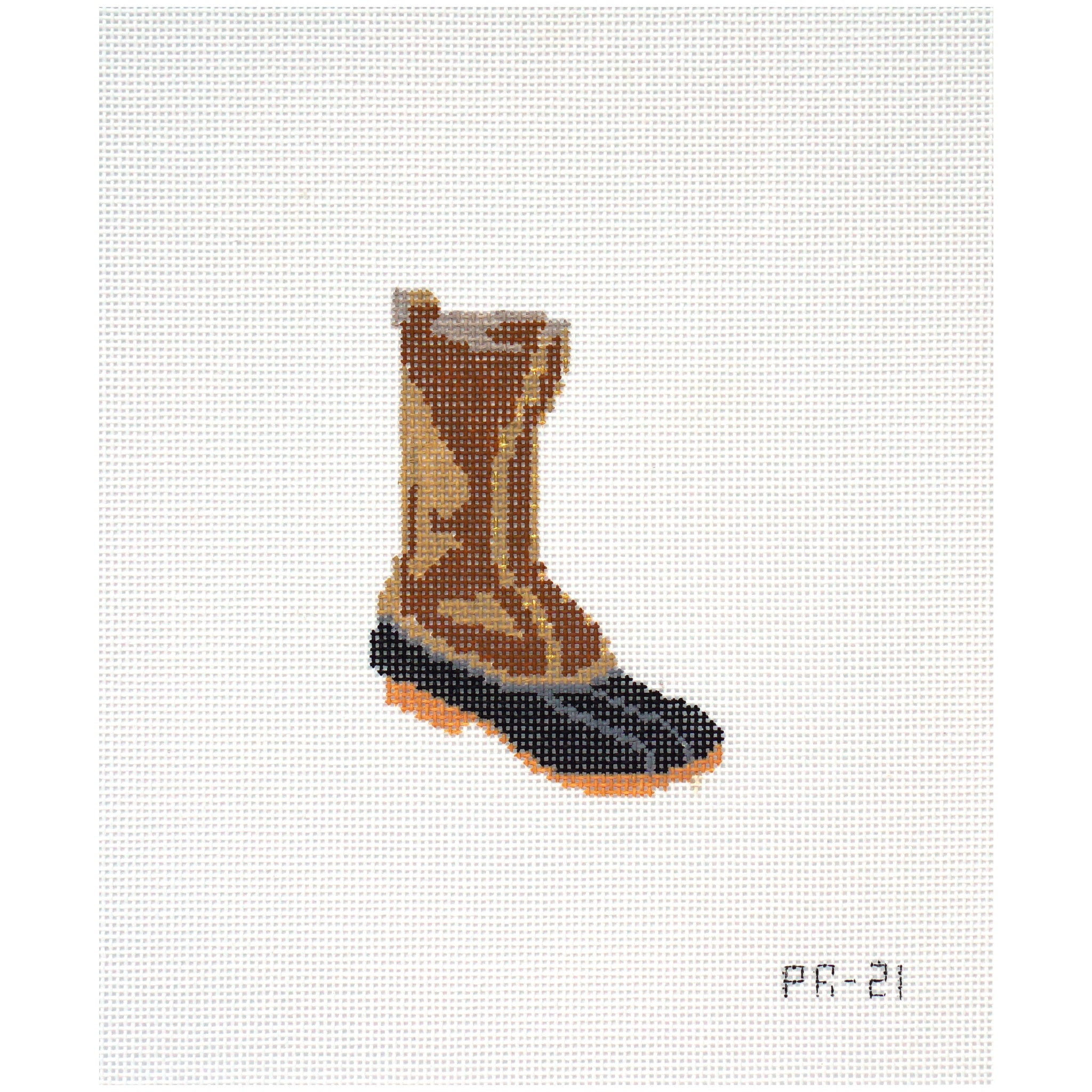 Needlepoint canvas of a duck boot on a white background