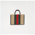 Needlepoint canvas design of a handbag with a colorful pattern on a white background