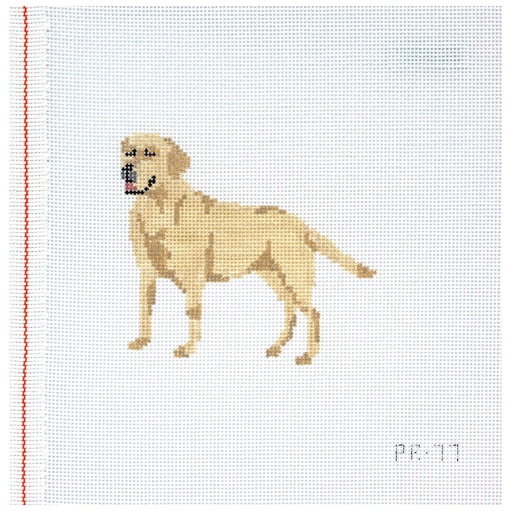Needlepoint canvas of a yellow lab dog on a white background