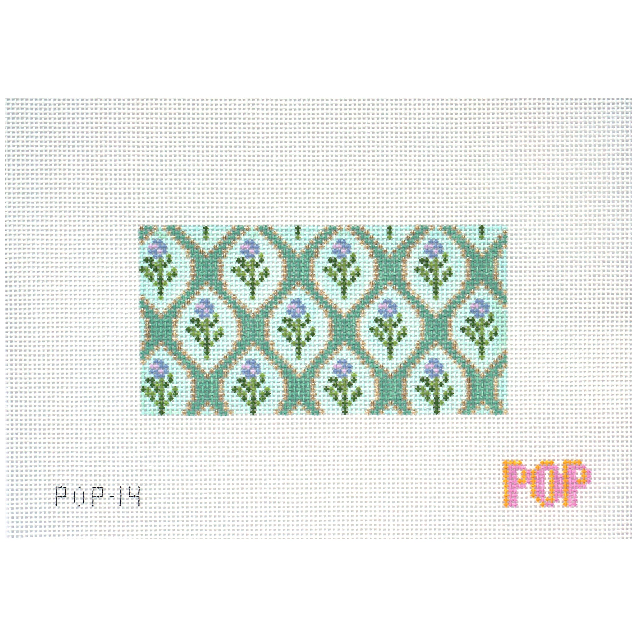 Needlepoint canvas with floral design on fabric