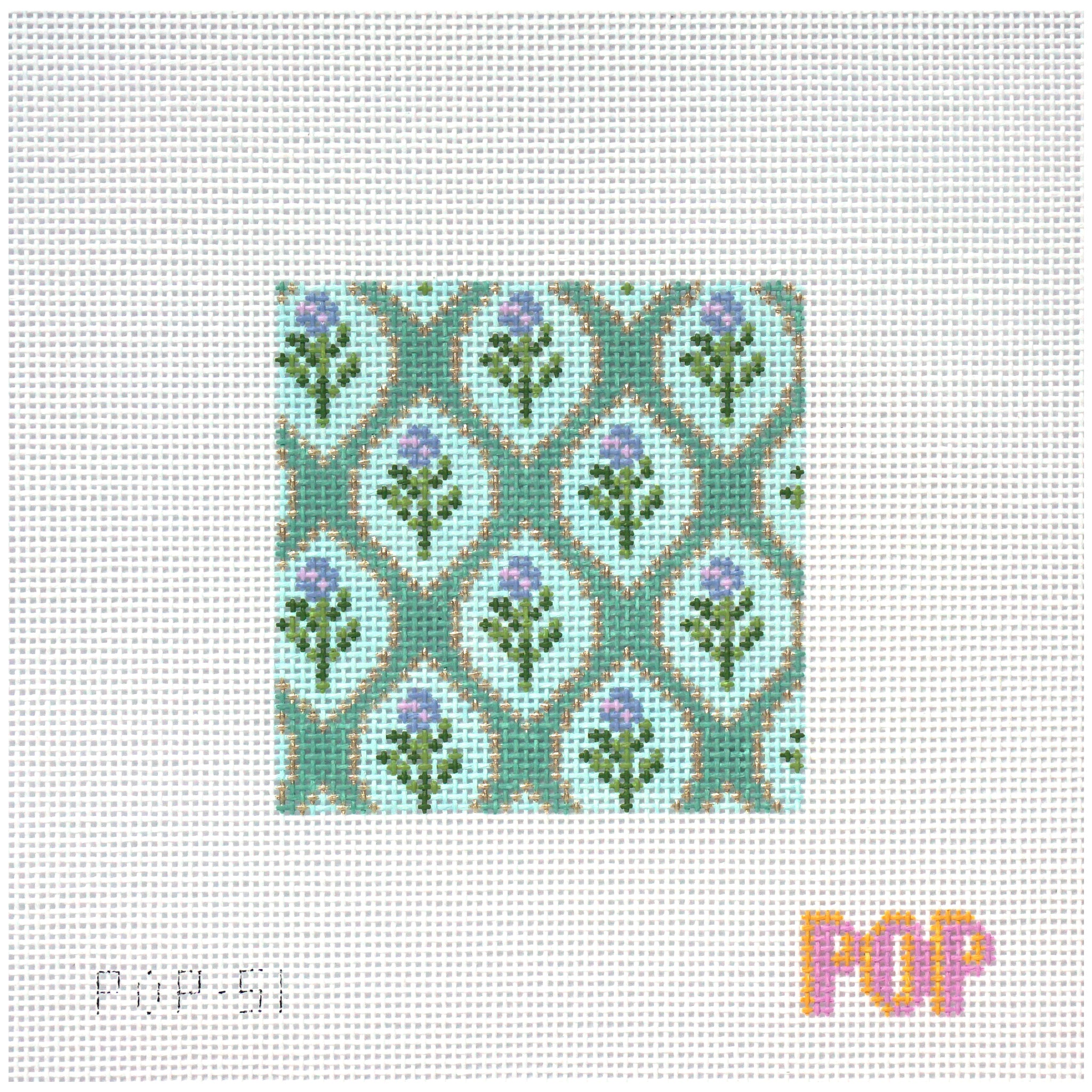 Needlepoint Canvas with floral design on a teal background