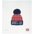 Needlepoint canvas of a winter hat that says 'apres-ski' in red and blue