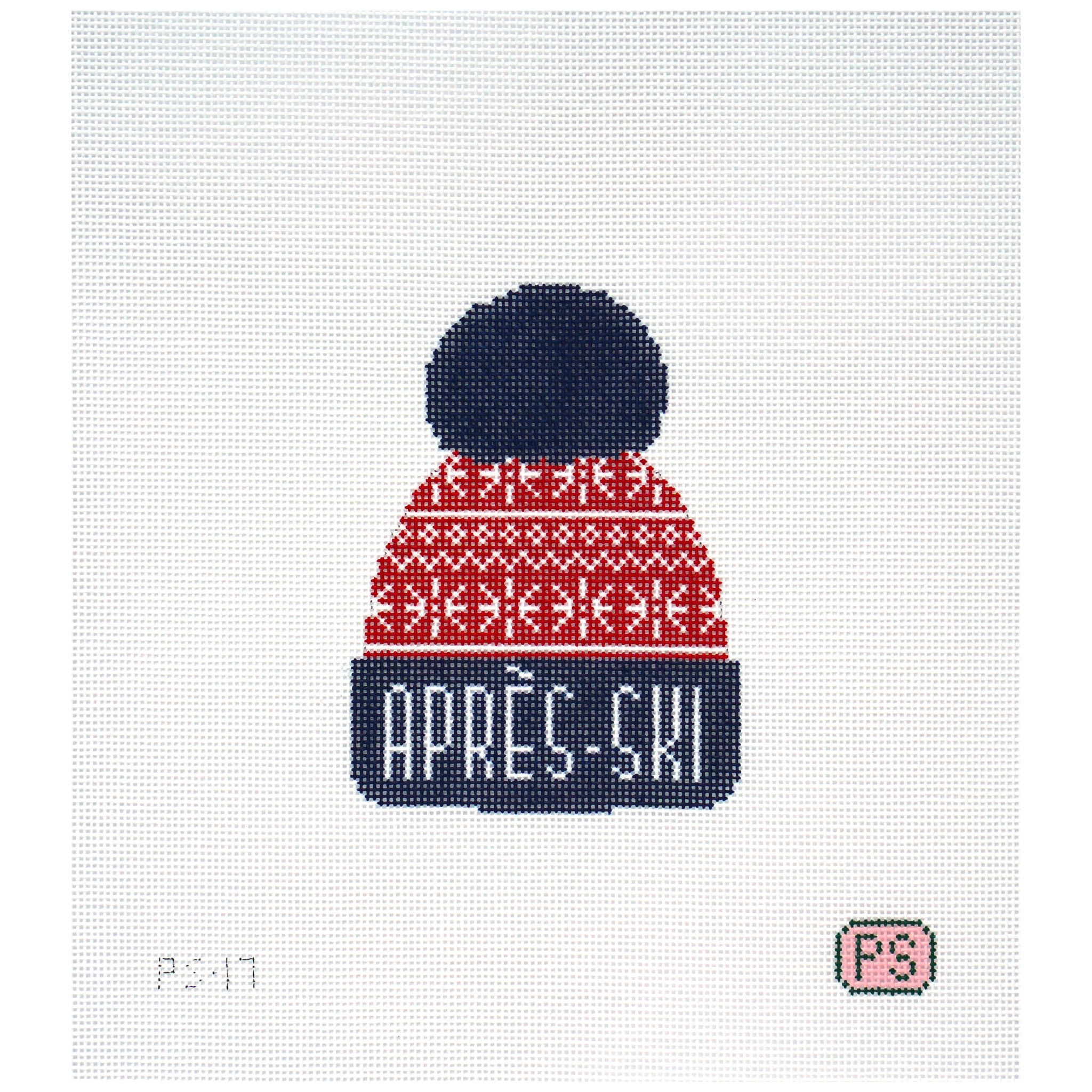 Needlepoint canvas of a winter hat that says 'apres-ski' in red and blue
