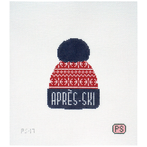 Needlepoint canvas of a winter hat that says 'apres-ski' in red and blue