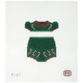 Needlepoint canvas of a green sweater with red trim on a white background