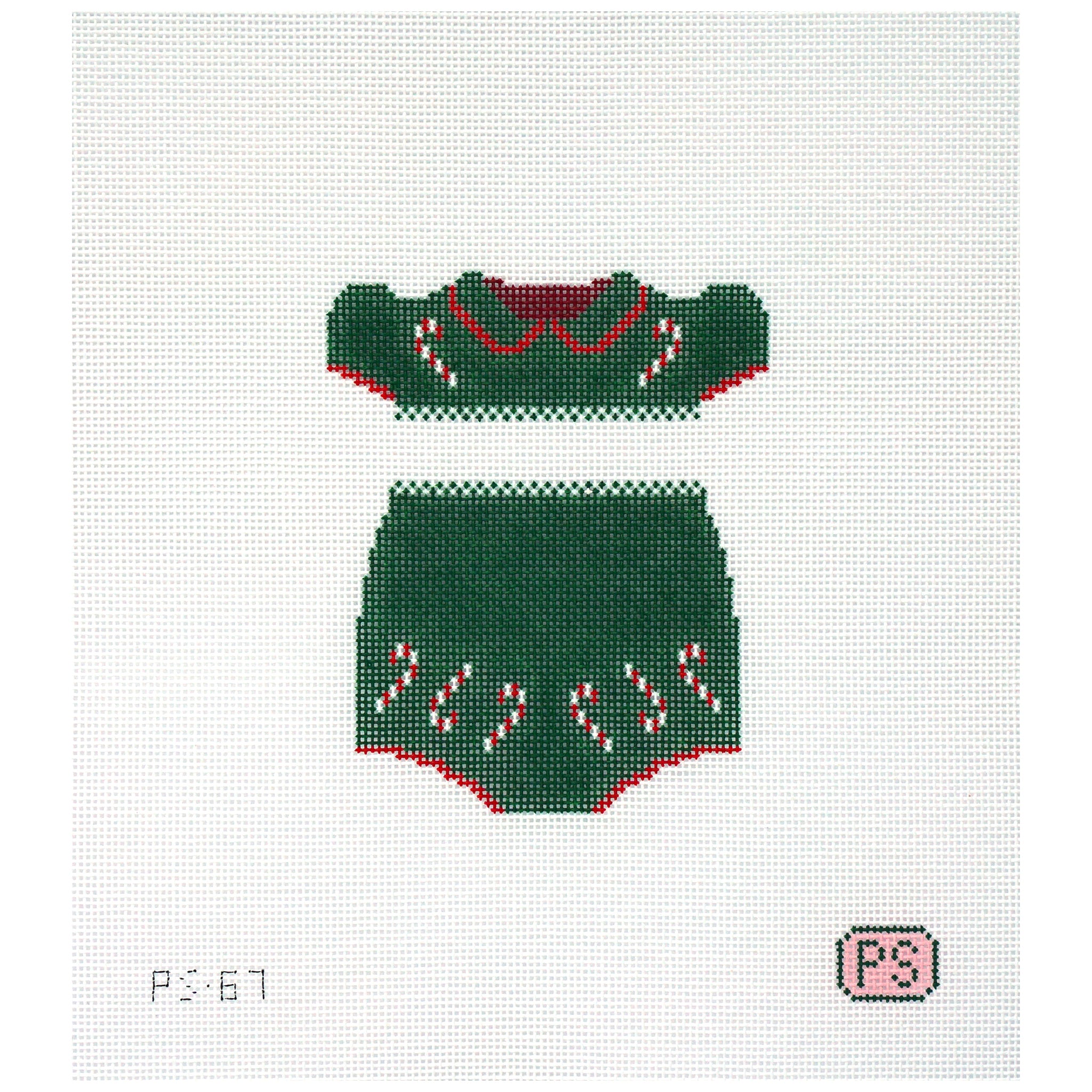 Needlepoint canvas of a green sweater with red trim on a white background