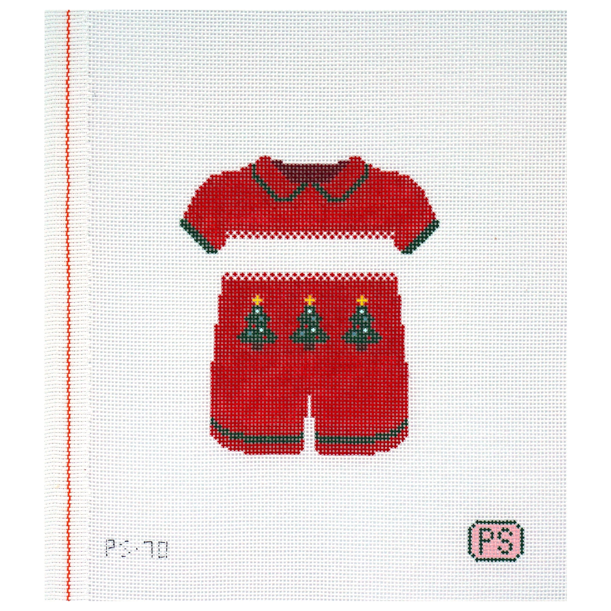Needlepoint canvas of a red outfit with Christmas tree designs on a white background