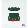 Needlepoint canvas of a green dress with candy cane details on a white background
